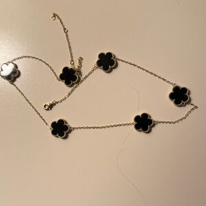 Elegant Black and Gold Clover Necklace